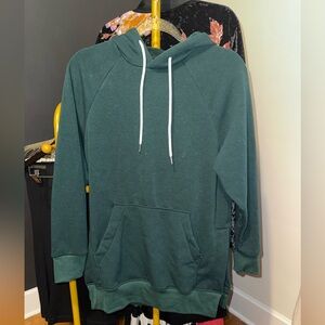 Green Hoodie with Front Pocket And Full Fleece Though out.